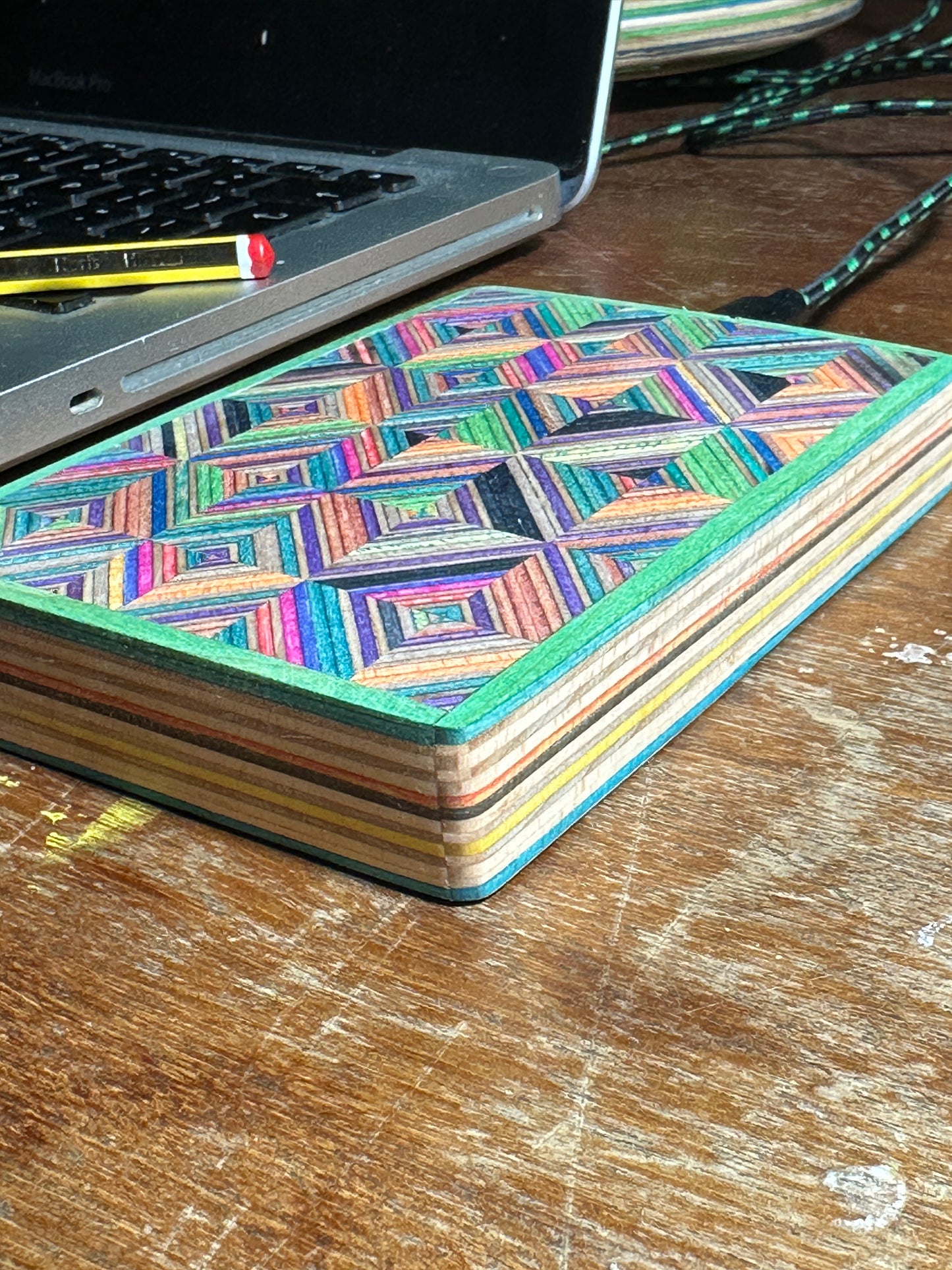 Wireless charger. Made with Recycled skateboard & birch Plywood.