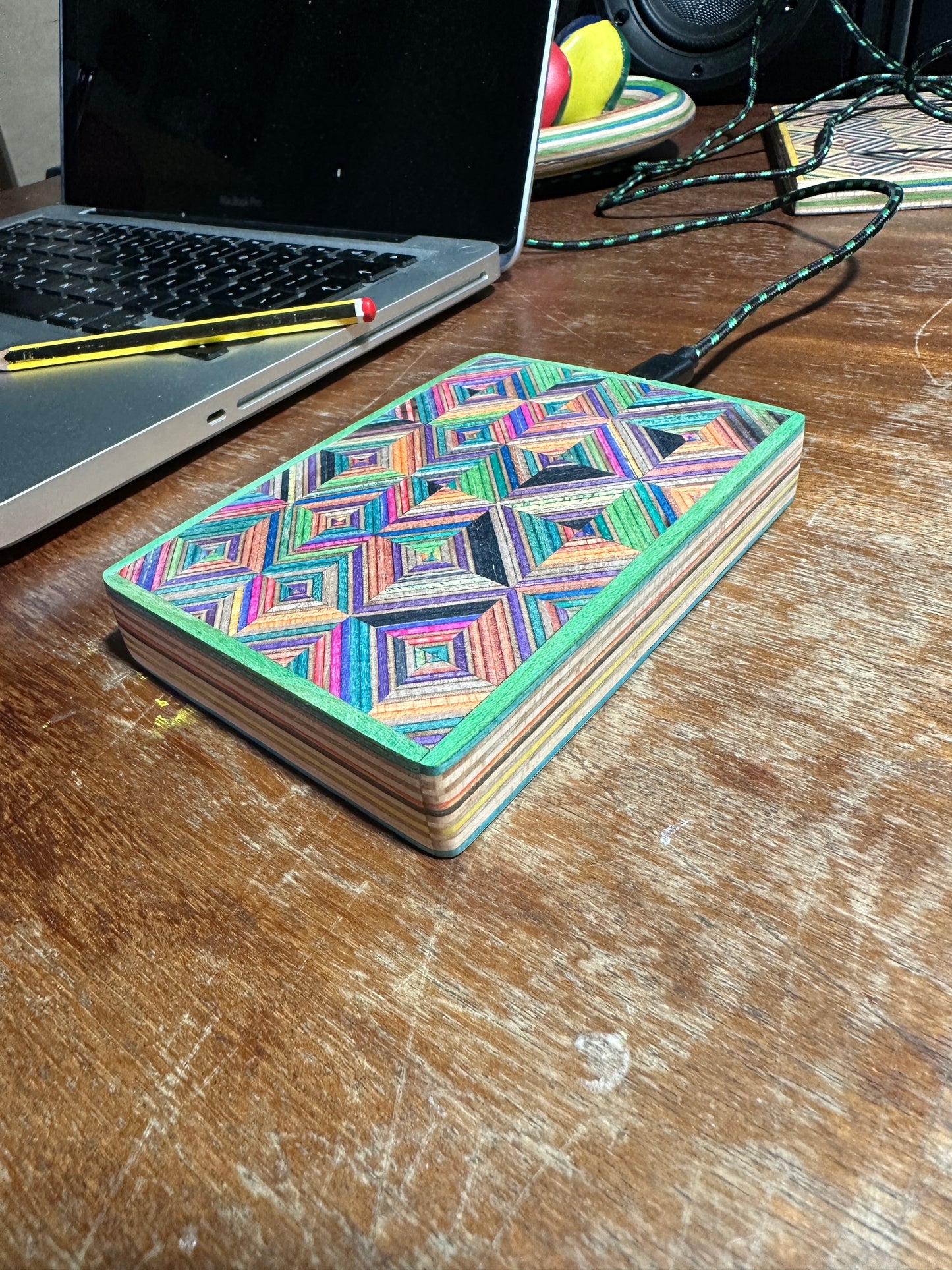 Wireless charger. Made with Recycled skateboard & birch Plywood.