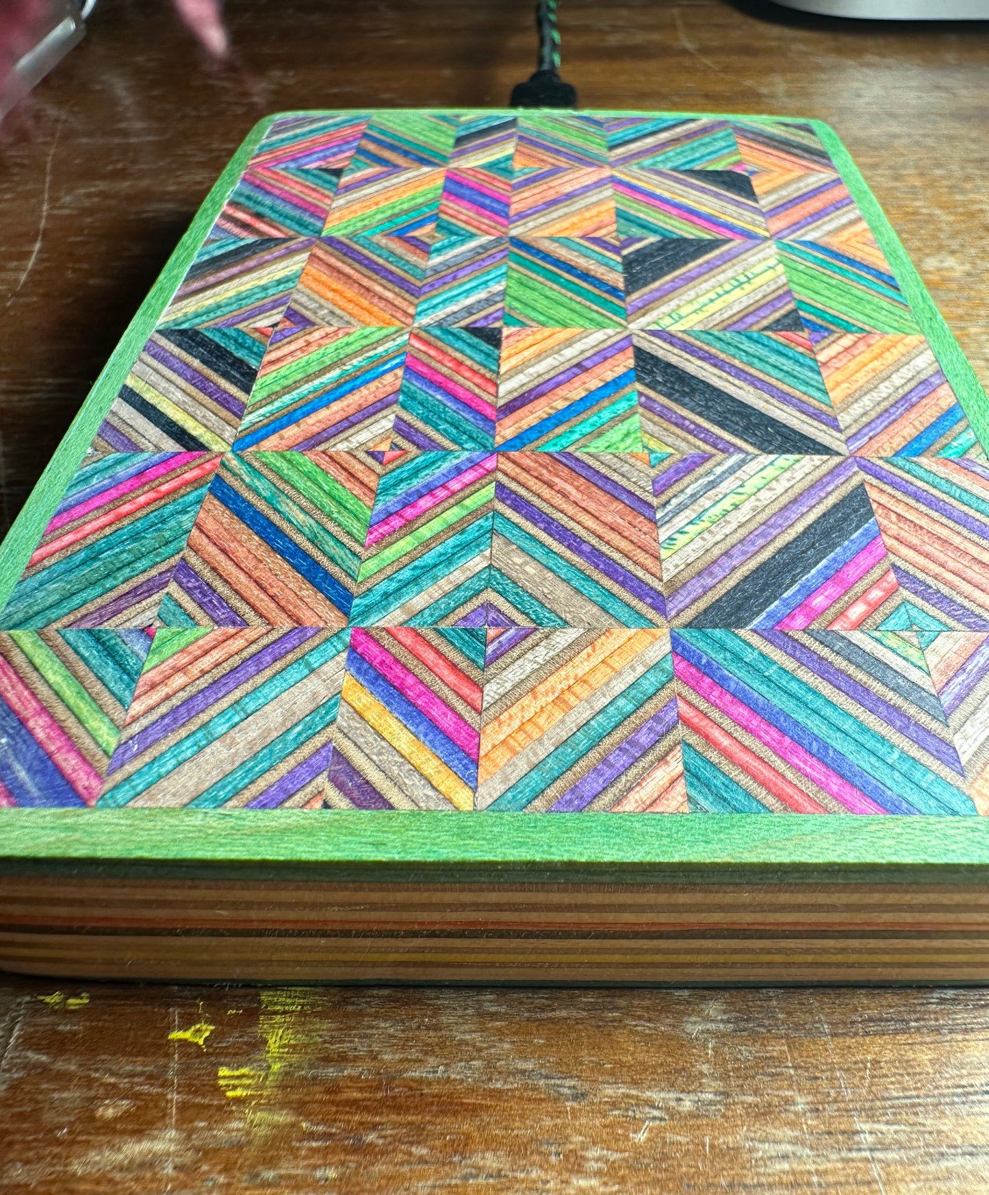 Wireless charger. Made with Recycled skateboard & birch Plywood.