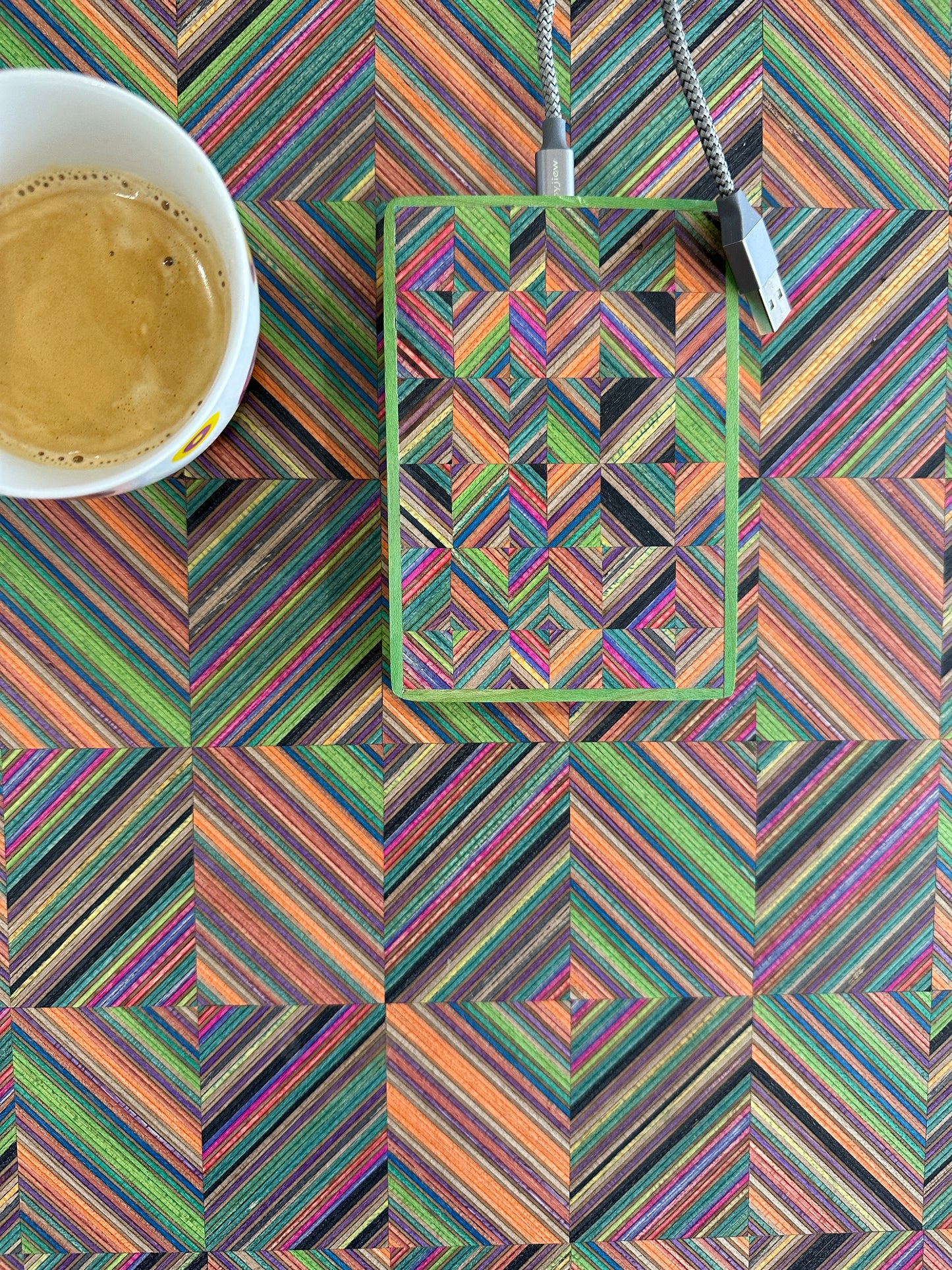 Wireless charger. Made with Recycled skateboard & birch Plywood.