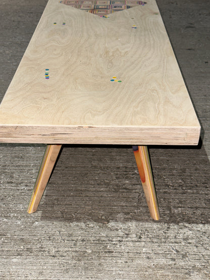 Birch plywood coffee table with geometric skateboard inlay and legs