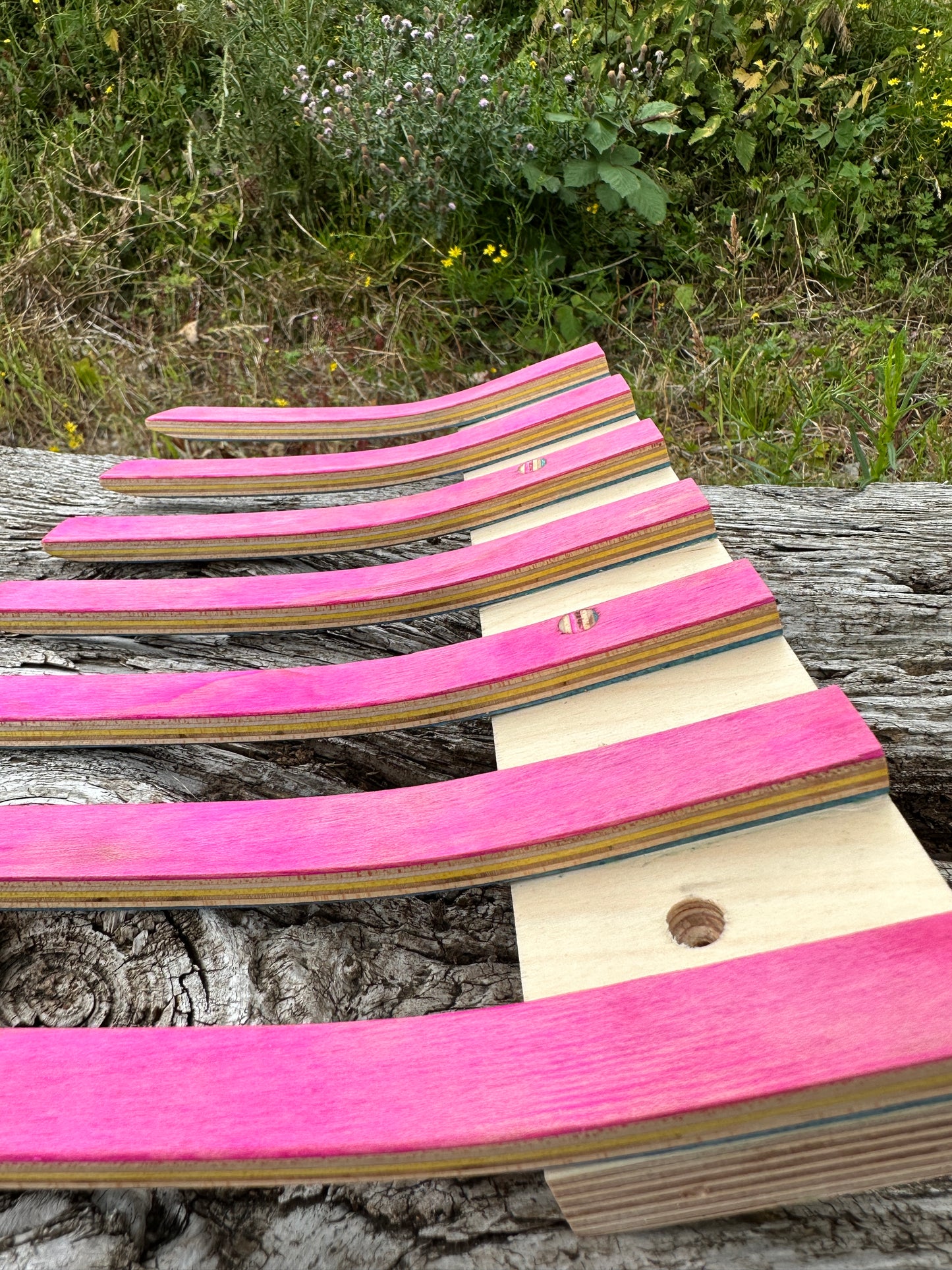 A coat rack, made with a single nose from an upcycled FA skateboard & reclaimed birch plywood.        One of One