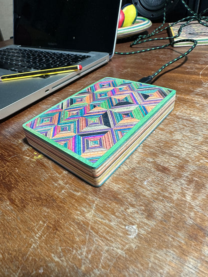 Wireless charger. Made with Recycled skateboard & birch Plywood.