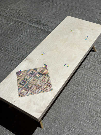 Birch plywood coffee table with geometric skateboard inlay and legs